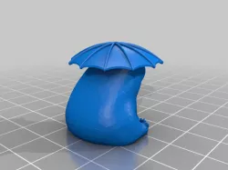 Fred the frog but he is wearing an umbrella hat