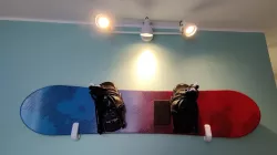 Snowboard wall mount
