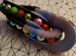 The Triple Chain (Twisty sliding marble puzzle)