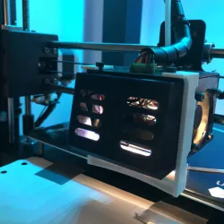 Build plate scraper/pusher for automatic prints
