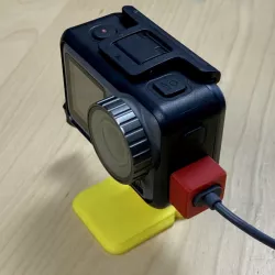 Dust cap with USB-C cable slot for DJI Osmo Action