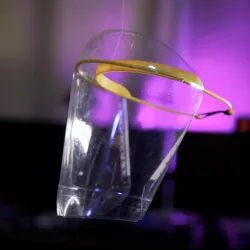 Face shield with two-liter bottle for screen and other easy to find materials