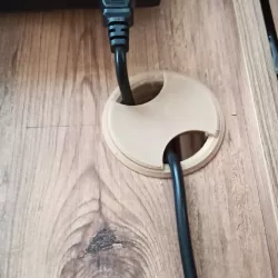 Table cable hole cover