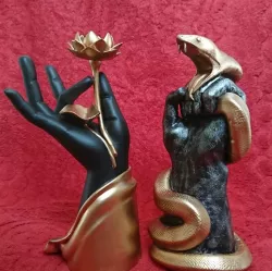 Evil hand - holding snake