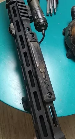 M-lok mount for O-Light Odin Mini flashlight switch
