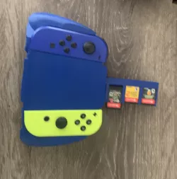 Switch Joycon holder with pop out extra holder and game storage