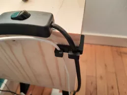 Bedside table cable guide
