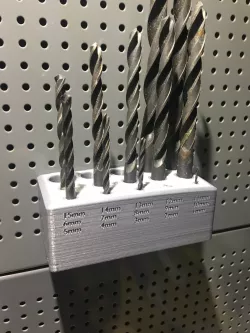 Drill bit holder for pegboard with 4mm holes and 12mm spacing (Biltema)