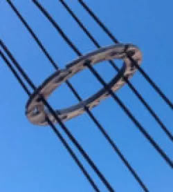Wire separator for cage antenna