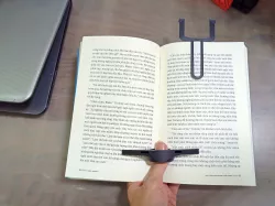Page holder and bookmark