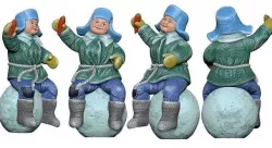 001352 seating boy on a snowball with a carrot in hand 3D model