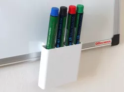 Marker holder on a magnetic board