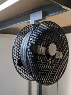 Metal shelving spool holder