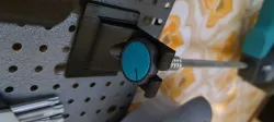 Pegboard holder for wolfcraft silicone gun