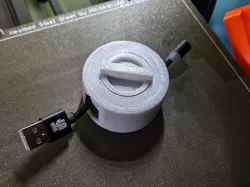 Print-in-place cable winder "puck", no supports necessary (uses slicer trick)