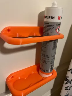 Caulk tube wallmount