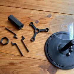 CD-R spindle case turntable for filament spool