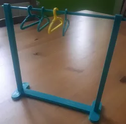 Doll clothes hanger