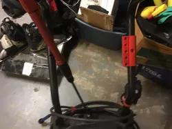 Pressure washer nozzle holder.