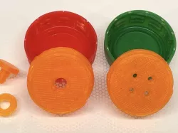 Button for soda bottle caps