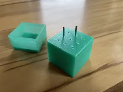 Sewing machine needle box