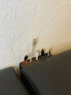 Couch cable holder