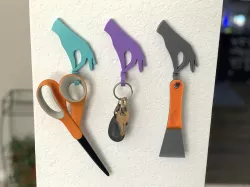 Hand with Pinched Fingers Swivel Wall Hook