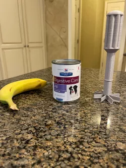 Handheld canned pet food grinder