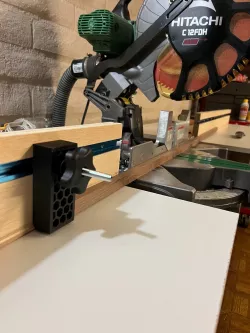 Stop block for miter saw station