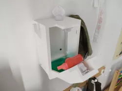 Child-resistant spray bottle storage