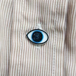 Eye-shaped button