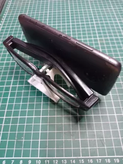 Holder for glasses and cell phone