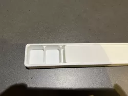 Pill box with sliding lid