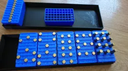 Pins and storage box for "small-bore rifle" competition