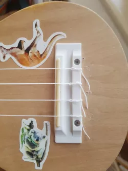 Ukulele tie bar / bridge and saddle