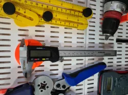 Caliper holder for Elfa pegboard