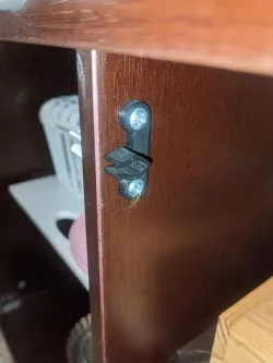 Clip for toy cabinet