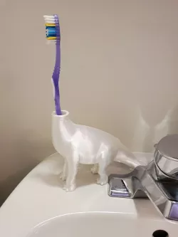 Dinosaur toothbrush holder merged
