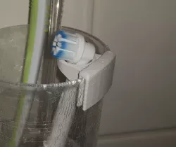Oral B - toothbrush holder for a cup / can 