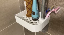 Shower rail shampoo basket