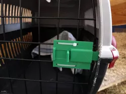 Sliding door bolt for pet transport box