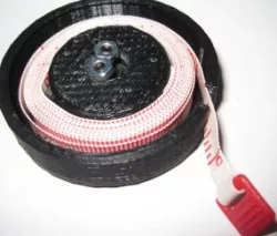 Spring loaded retractable measuring tape