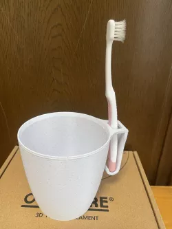 Tooth brush holder cup