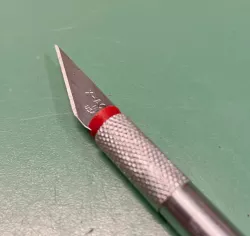 Xacto knife insert