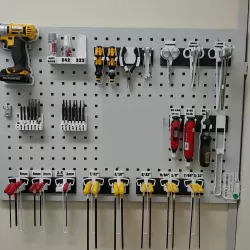 Compact, specific hand tool holders on peg board