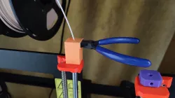 Fillament head catcher for wire cutter