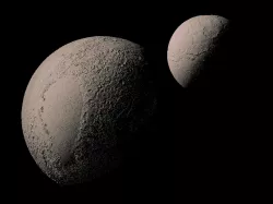 Pluto and Charon with known topography scaled one in ten million