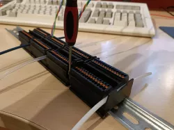 bowden tube DIN-rail mount