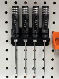 Hex driver holder for pegboard rivets
