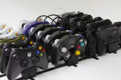 Modular controller stands for multiple consoles